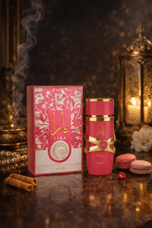 Lattafa Yara Candy perfume bottle and box surrounded by cinnamon and sweet notes, elegant women’s fragrance